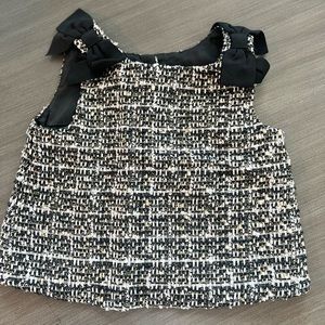 Black, gold, and white dress top